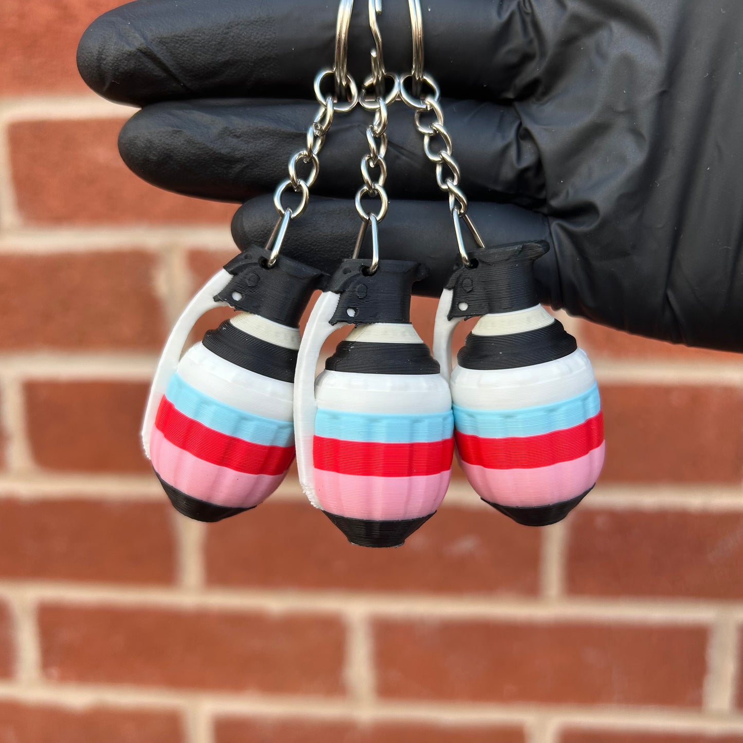 RUNNING MAN GRENADE KEYRING